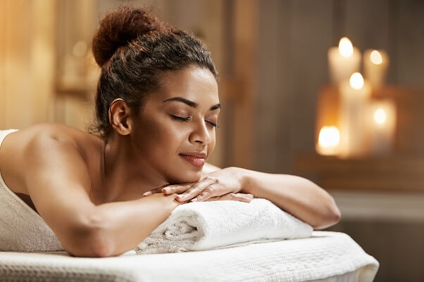 Beautiful woman relaxing in spa resort