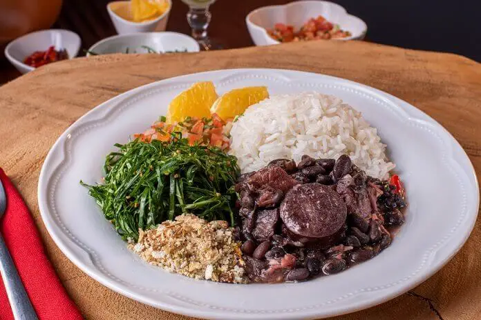 Brazilian dish called Feijoada. Made with black beans, pork and sausage