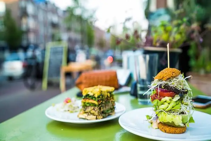 Raw vegan food on a table of sidewalk café on Fort Myers