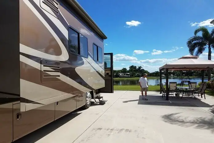 A man enjoy his day after park his RV at Cypress Woods RV Resort