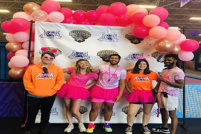 Friends enjoying pink event at Altitude Trampoline Park in Fort Myers
