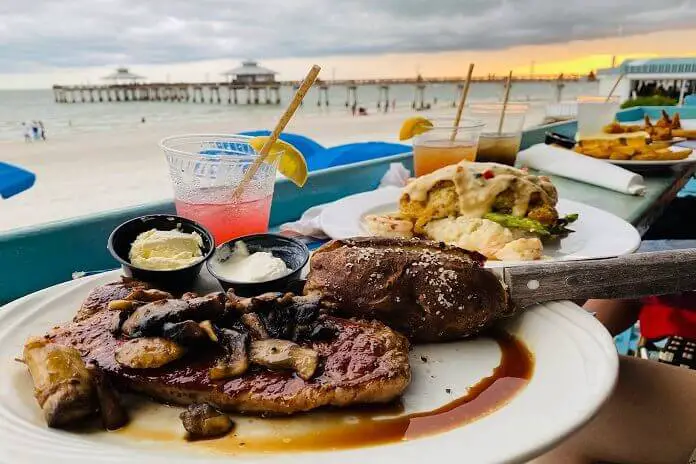 Enjoy food with view at Sunset Beach Tropical Grill