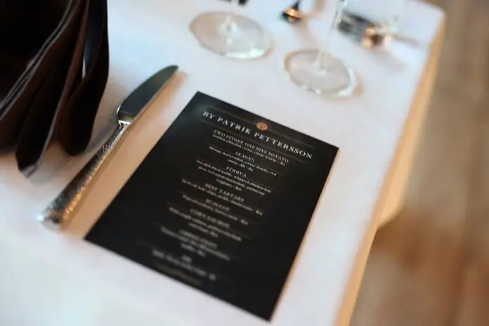 Menu page on the table of By Patrik Pettersson at Kompose Hotel